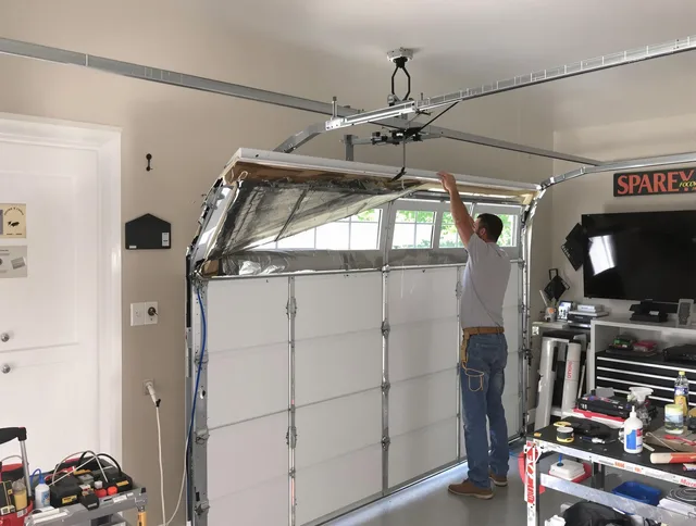 Garage door section replacement by Windham Garage Door Repair in Windham