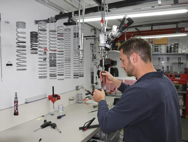 Windham Garage Door Repair safety certified technician performing precision spring replacement in Windham